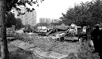 對公園選址的5.5萬多平方米的違章建筑進(jìn)行拆除。