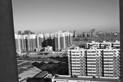 鄭州市冉屯北路上的一處安置房小區(qū) 鄭州市冉屯北路上的一處安置房小區(qū)