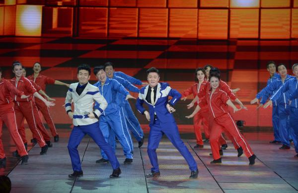 《小蘋果》、《最炫民族風》等廣場舞曲將會有全國統(tǒng)一、編排科學、帶給人正能量的全新動作。 CFP 資料