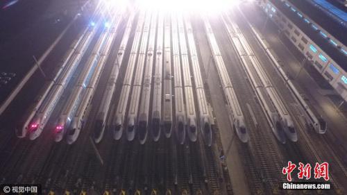 資料圖：高鐵“萬箭齊發(fā)”勢如“陸地航母”。 圖片來源：視覺中國